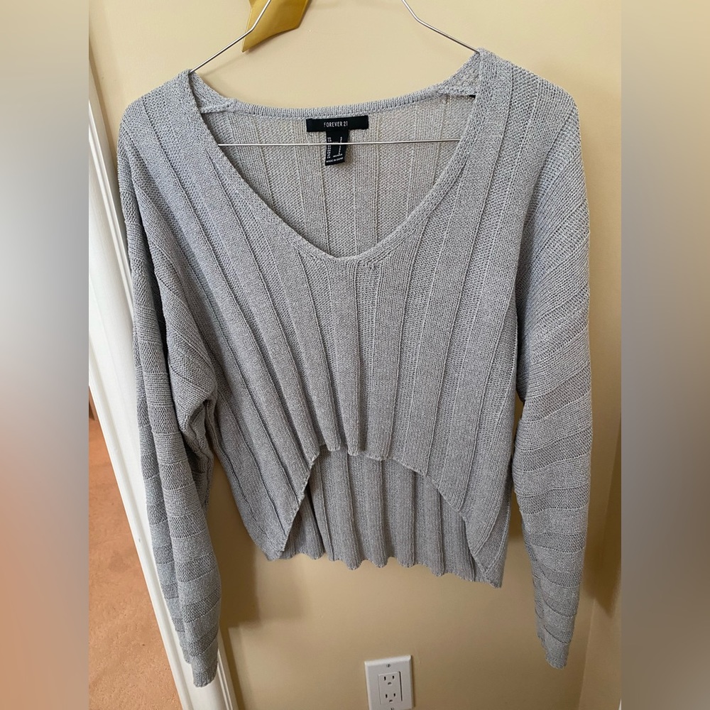 Gray sweatshirt.